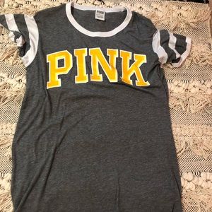 grey and yellow pink brand shirt